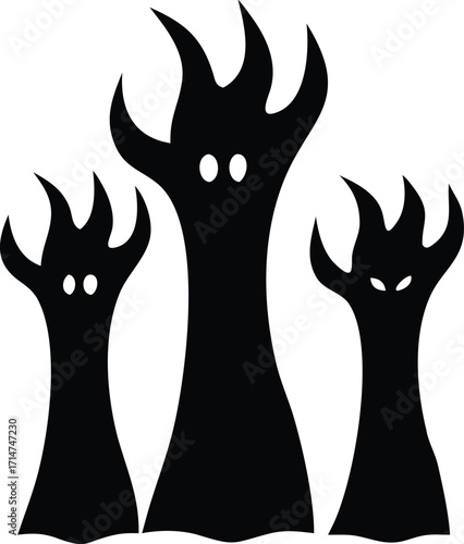 Three spooky black monster hands reaching out of the ground