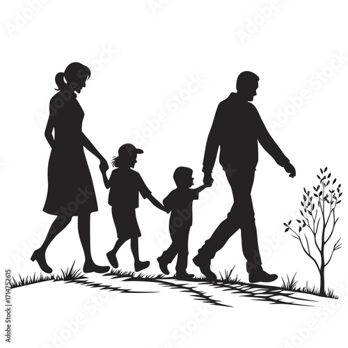A family of four walking together holding hands on a grassy path with a small tree