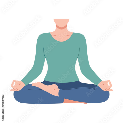 A person in a teal top and blue pants sitting cross-legged in a meditation pose with hands in a mudra.