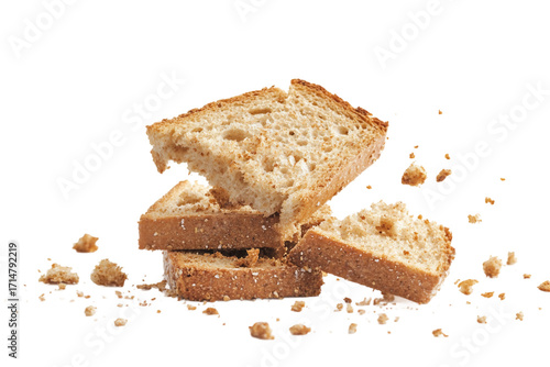 Pieces of bread rusks with scattered crumbs isolated on transparent background