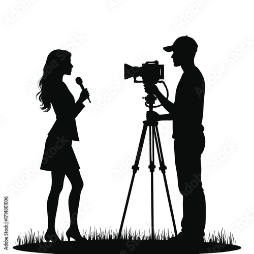 Silhouette of reporter interviewing with camera operator