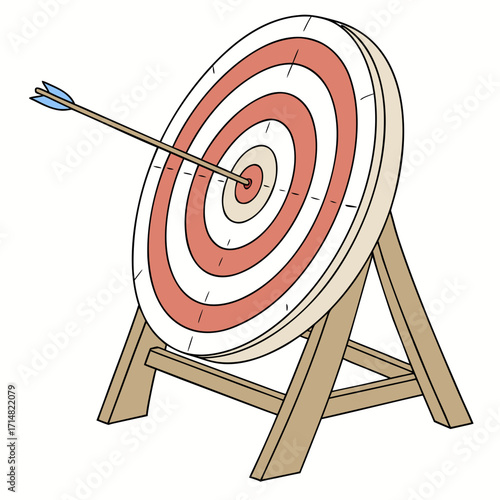 A perfectly aimed arrow hits the bullseye of a traditional archery target on a wooden stand
