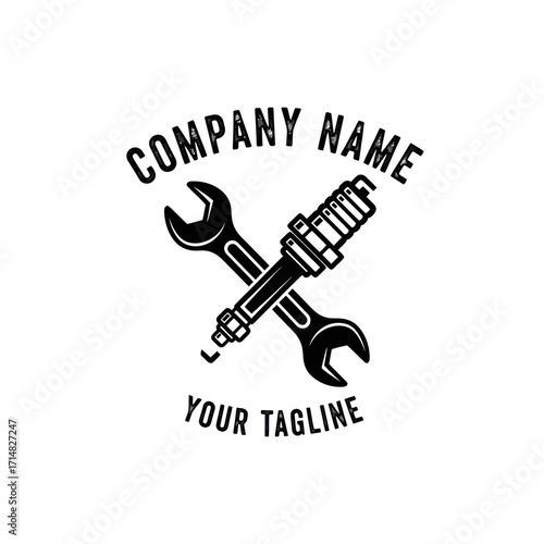 Logo design featuring crossed wrench and spark plug.