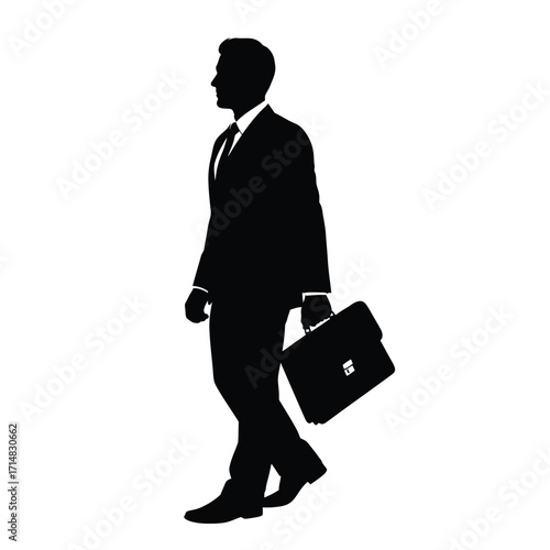 A businessman walking with a briefcase a striking dark silhouette