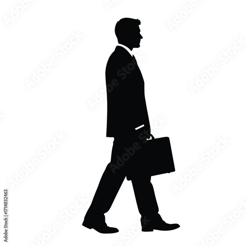 A businessman walking forward with a briefcase a striking silhouette