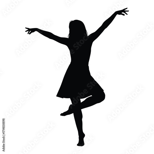 A joyous woman dancing with arms raised in a dark silhouette
