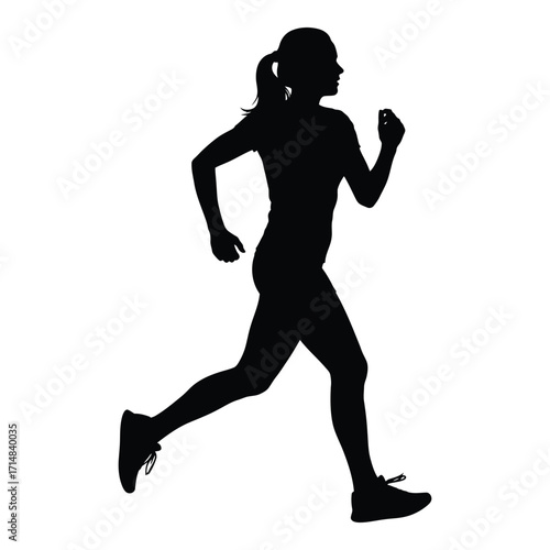 A dynamic female runner in action depicted as a strong silhouette