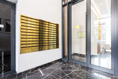 mailboxes in the lobby of an apartment building