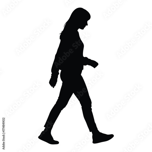 A woman walking forward depicted in a striking black silhouette