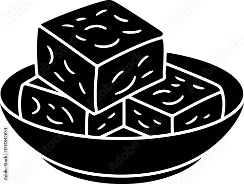 Black cubes in bowl paneer white