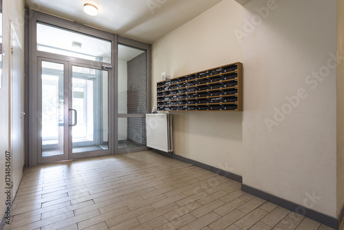 mailboxes in the lobby of an apartment building