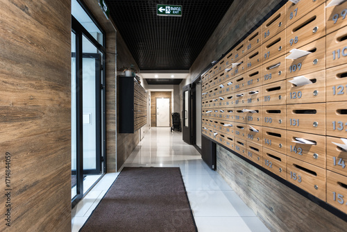 mailboxes in the lobby of an apartment building