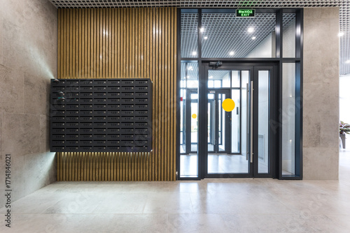 mailboxes in the lobby of an apartment building