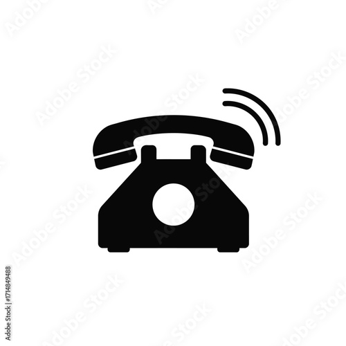 Silhouette of classic rotary telephone with keypad and handset on a white background. EPS 10.