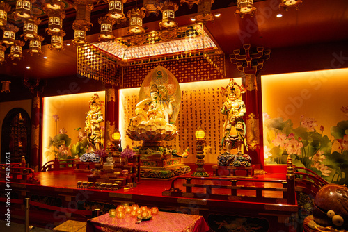 Ταπετσαρία Ornate temple interior with deity statue and lanterns