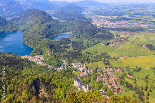 Photography Aerial view of Neuschwanstein Castle, Alpsee and Schwansee in the Bavarian Alps,