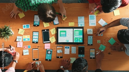 Canvastavla Top view of developer team working together to write idea about Ux ui design on colorful sticky note