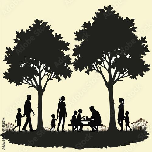 Silhouetted family enjoying picnic under trees park