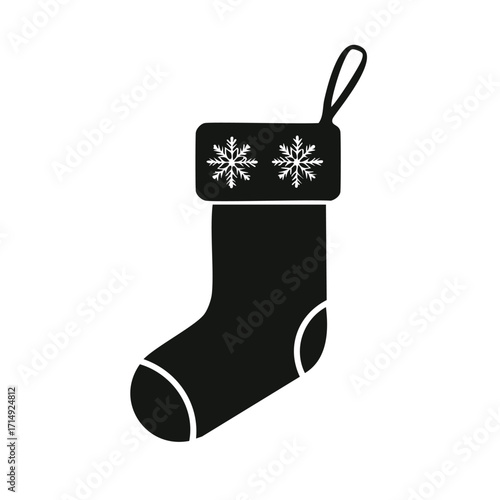 Black and white silhouette of a Christmas stocking with snowflakes Keywords: christmas stocking