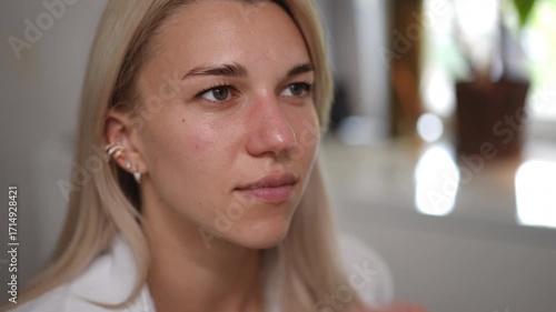 A closeup image depicting a highly detailed beauty consultation process for assessing the clients facial treatments