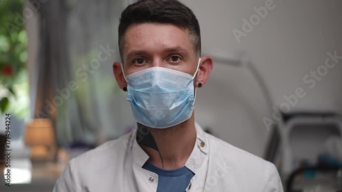 In a clinic, a healthcare worker prepares a vaccine, stressing the importance of safety measures and protocols