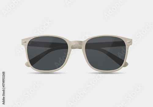 Beigeframed sunglasses with dark lenses centered on a plain background