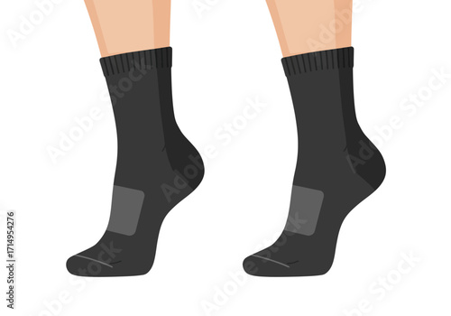 Two legs wearing dark socks with reinforced grey areas
