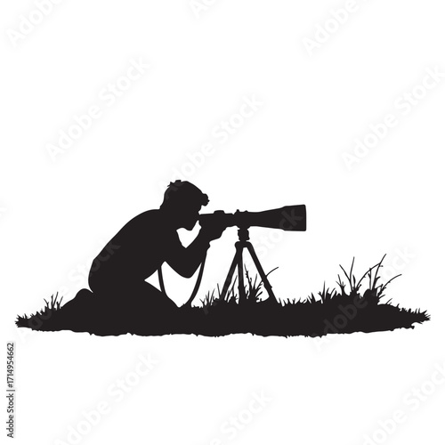 Silhouette of person with camera and tripod grass
