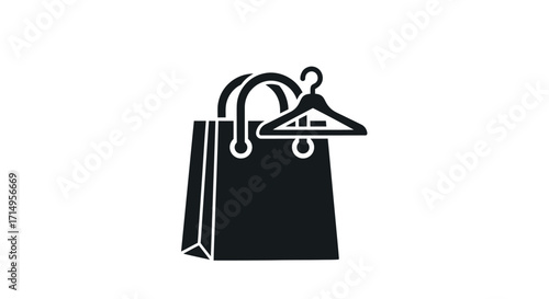Black silhouette icon of a shopping bag with a clothes hanger representing fashion retail and apparel purchases.