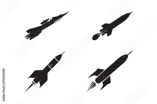Four black silhouettes of rockets and missiles in flight