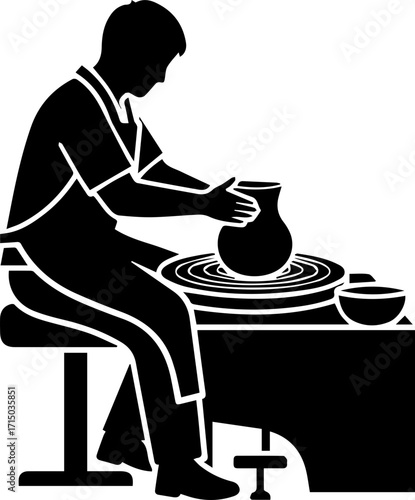 Skilled artisan shaping clay on pottery wheel, creating beautiful ceramic art with focused precision.