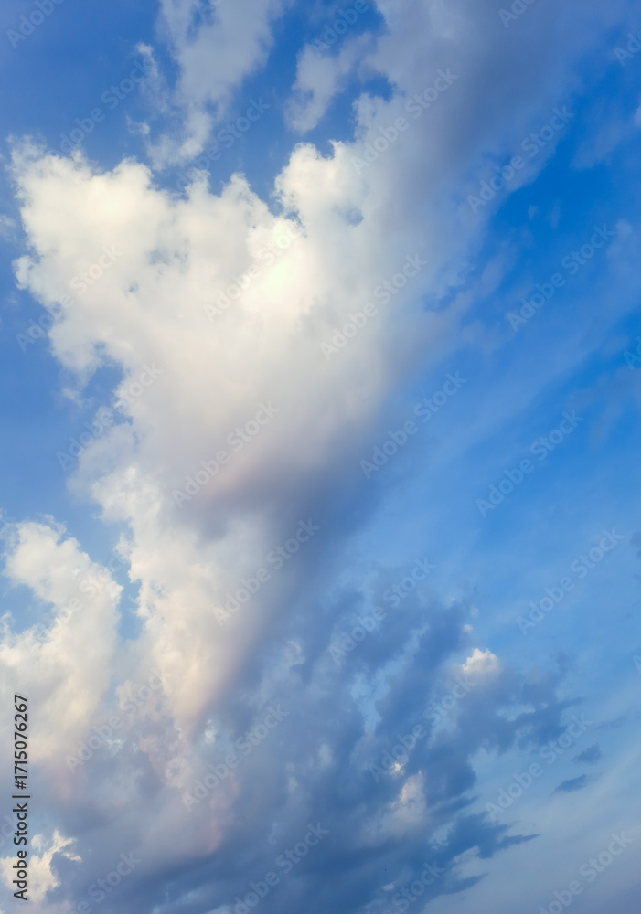 Fototapeta premium White clouds flying across the blue sky. copy space