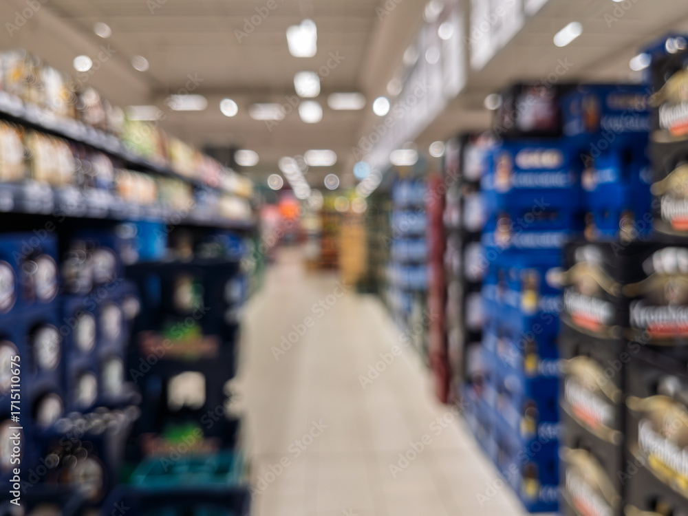 Fototapeta premium Blurred Background in Grocery Store Aisle Focused on Beverages