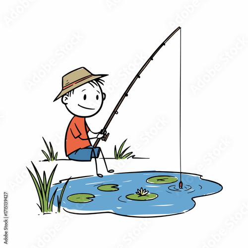 A young boy wearing a hat and an orange shirt sits by a pond with a fishing rod, patiently waiting for a bite.