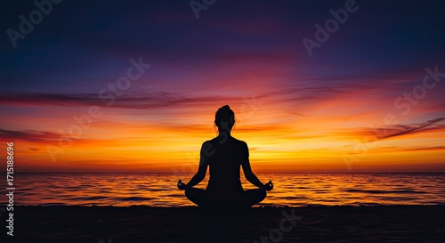 Wallpaper Mural Serene Silhouette: Woman Meditating on Beach at Sunset with Vibrant Sky Torontodigital.ca
