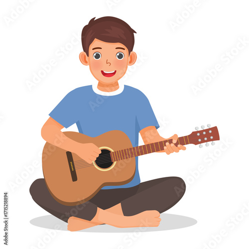 Man playing guitar sitting on the floor