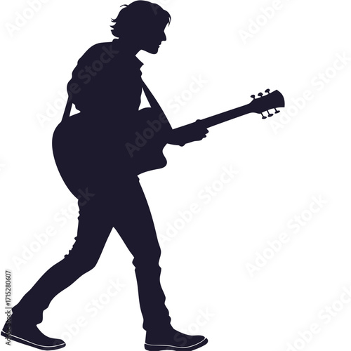 Silhouette of a male musician walking and playing an acoustic guitar with a strap over his shoulder