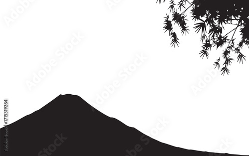 Mount Fuji rises majestically in the Japanese landscape, framed by delicate bamboo leaves, creating a serene and iconic scene.