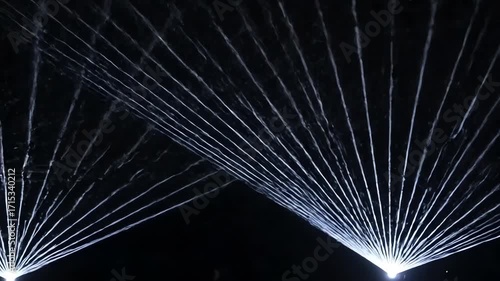 Seamlessly looping video of crisp white laser lines creating complex, intertwining abstract patterns complex, digital, connection