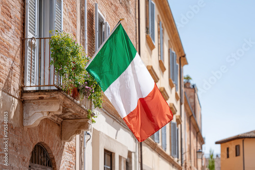 capture essence of italy with stunning photograph featuring italian flag gracefully waving against backdrop of