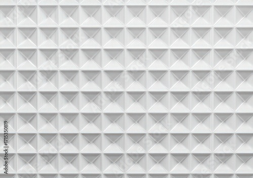 Abstract geometric wall pattern with repeating white pyramid shapes creating a three-dimensional textured surface