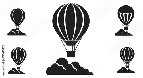Simple black and white illustration of several hot air balloons soaring