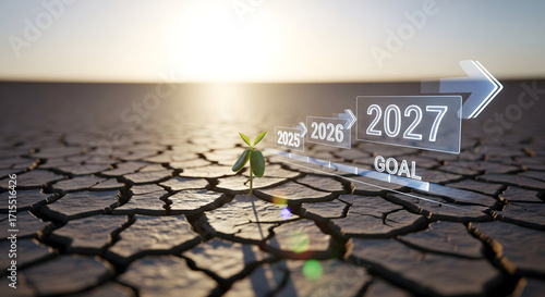 Sprout of hope emerges from dry earth towards future goals