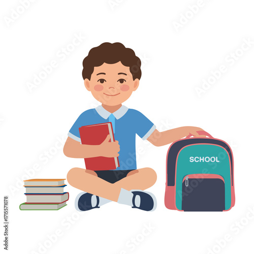 Smiling schoolboy with backpack and books