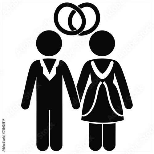 Silhouetted couple holding hands with wedding rings above their heads
