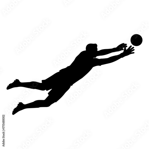 Silhouette of a soccer goalkeeper jumping to catch the ball