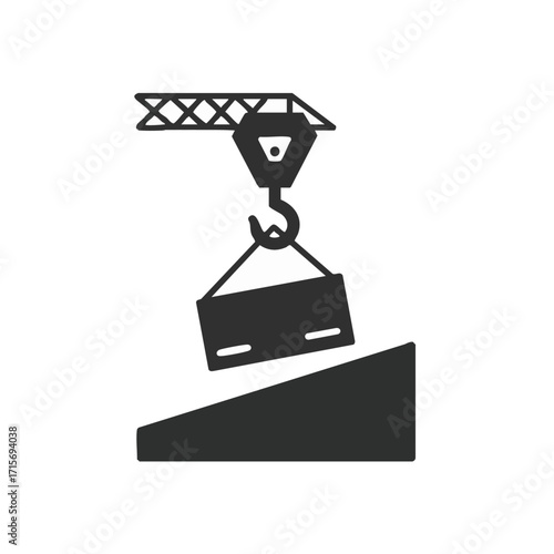 A stark black silhouette illustrates a powerful industrial crane expertly lifting a substantial construction load onto an inclined surface, symbolizing progress and heavy engineering work.
