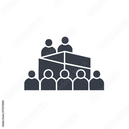 A graphic icon depicting a speaker at a podium addressing an attentive audience during a professional business meeting or conference, symbolizing communication.