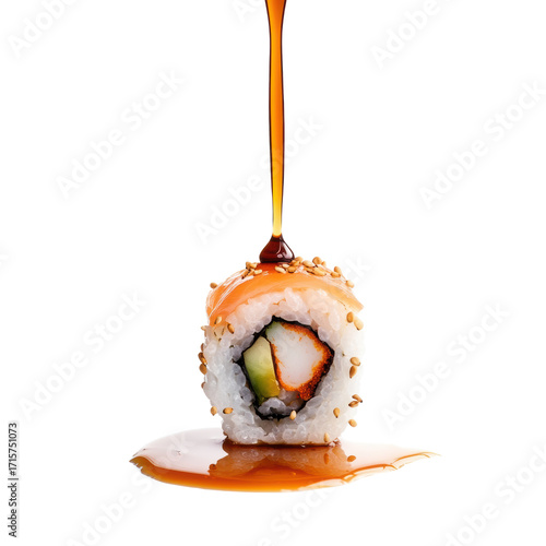 Drizzle drop of soy sauce drips from a fresh sushi roll. Traditional Japanese food