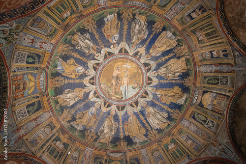 A vibrant, circular mosaic artwork adorning the dome of a building, showcasing religious figures and scenes, conveying a spiritual ambianc